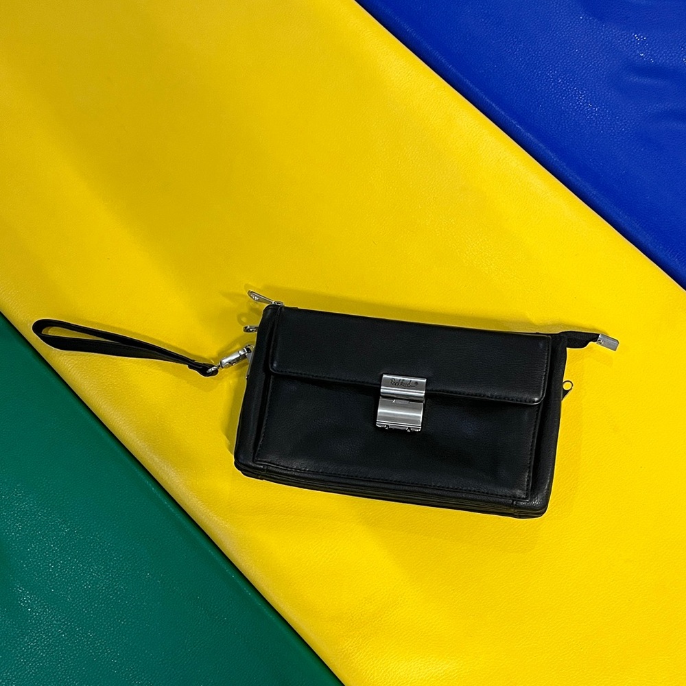Leather Waiter Wallet with combination lock pocket. By Rockfeld.